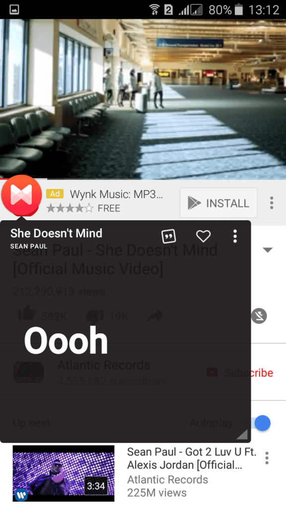 YouTube homepage and open any music video to see the lyrics